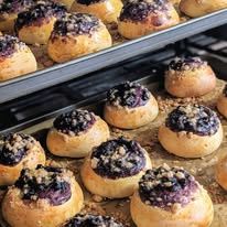 Buns topped with blueberries and streusel