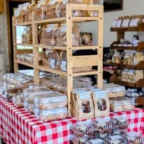 Wrapped bakes on a red gingham table in our shop