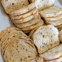 Stacks of sliced sourdough bread