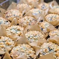 Streusel-topped muffins in parchment wraps